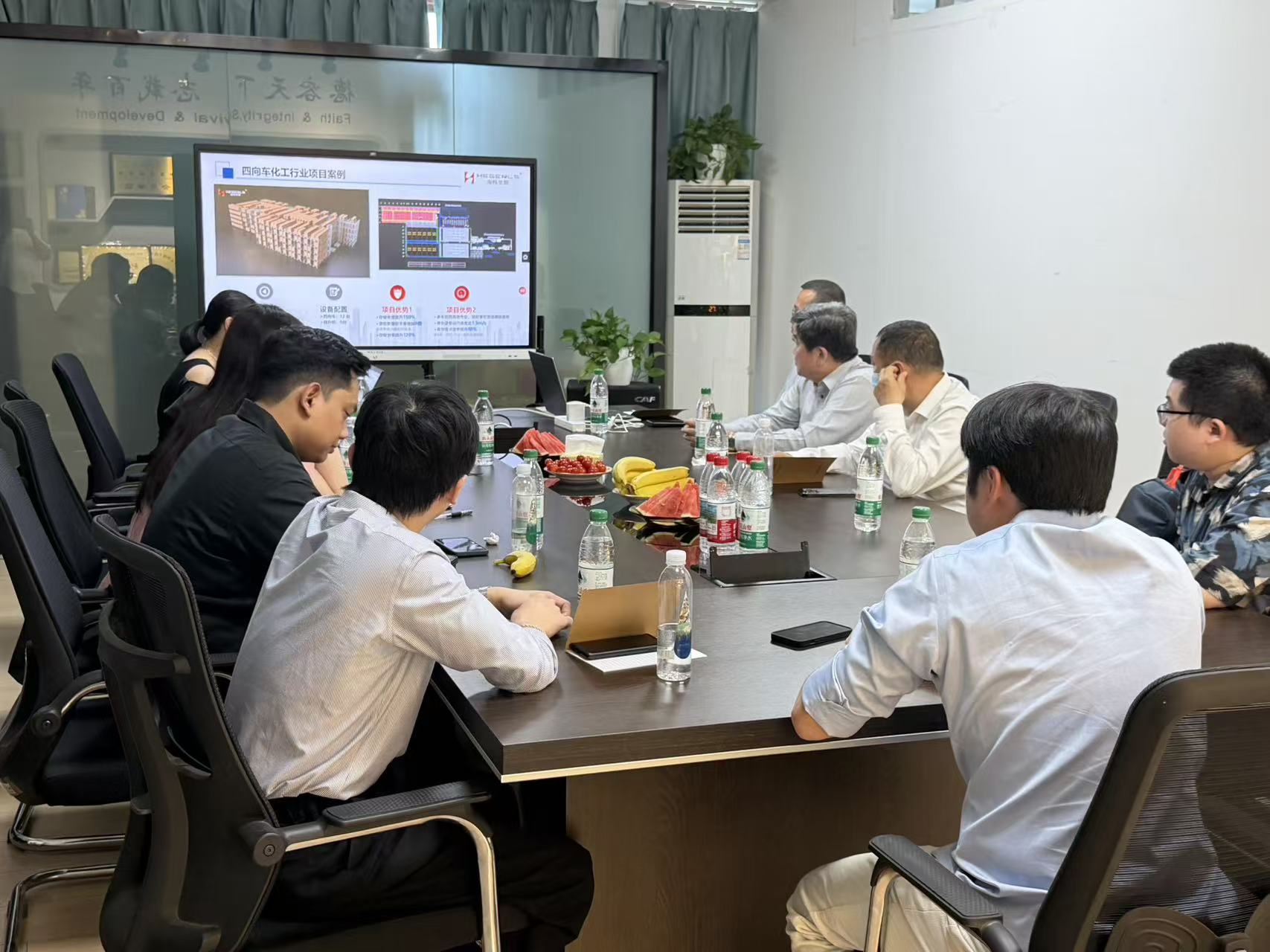 Zhuku team discussing ASRS solution with Indonesian customers