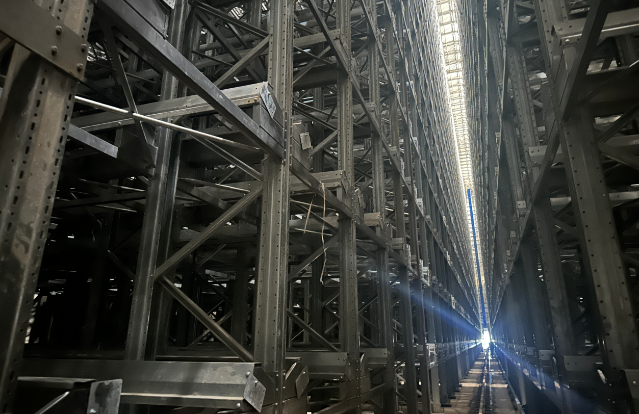 Structural load design for a rack-supported warehouse