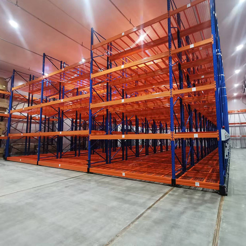 Electric Mobile Racking System moving pallet racks to optimize warehouse storage space